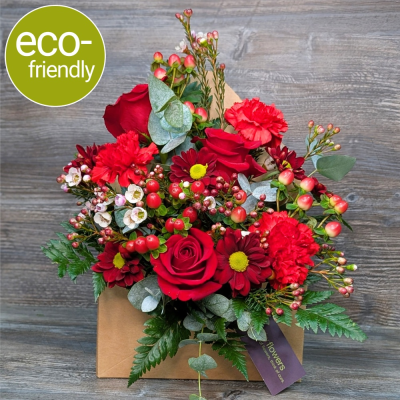 Sealed With A Kiss Valentine's Envelope Flower Box | First for Flowers - Send a unique Valentine's message with our "Sealed With A Kiss" arrangement. Three red roses & seasonal blooms in a chic cardboard envelope. Eco-friendly & beautifully presented.