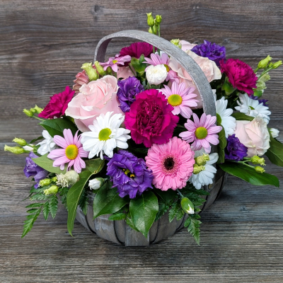 Vibrant Trug Basket Arrangement: Florist Choice, Darlington delivery - Order a unique, Vibrant trug basket arrangement filled with the freshest blooms, direct from our florist in Cockerton. Same day delivery or Click & Collect available.